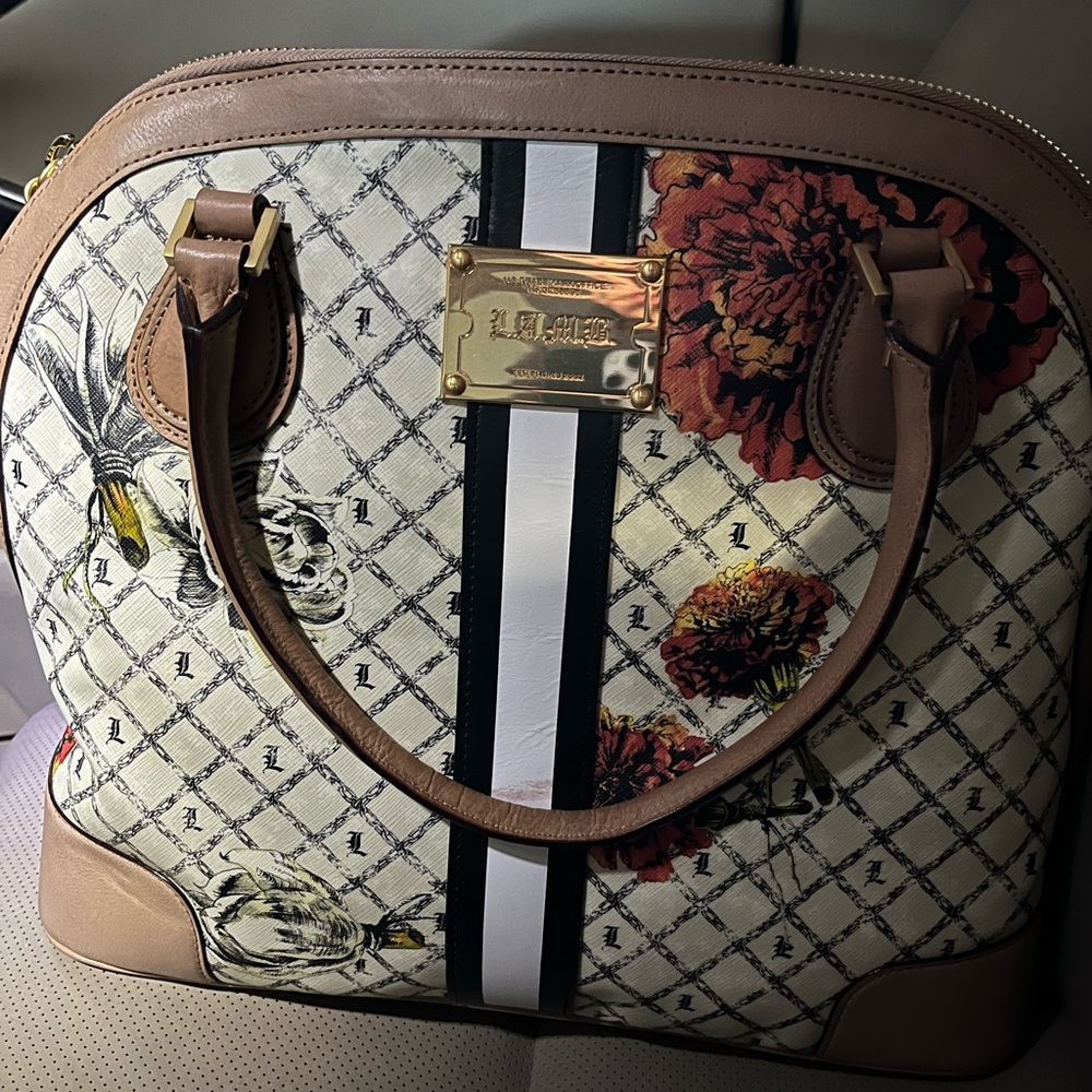 L.A.M.B authentic purse with dust bag used once